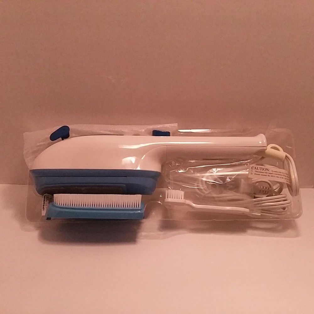 Avon Essentials Hand Held Portable Clothes Steamer