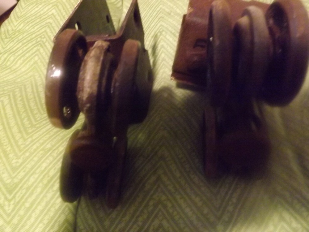 Antique barn door rollers (pair) good working order 