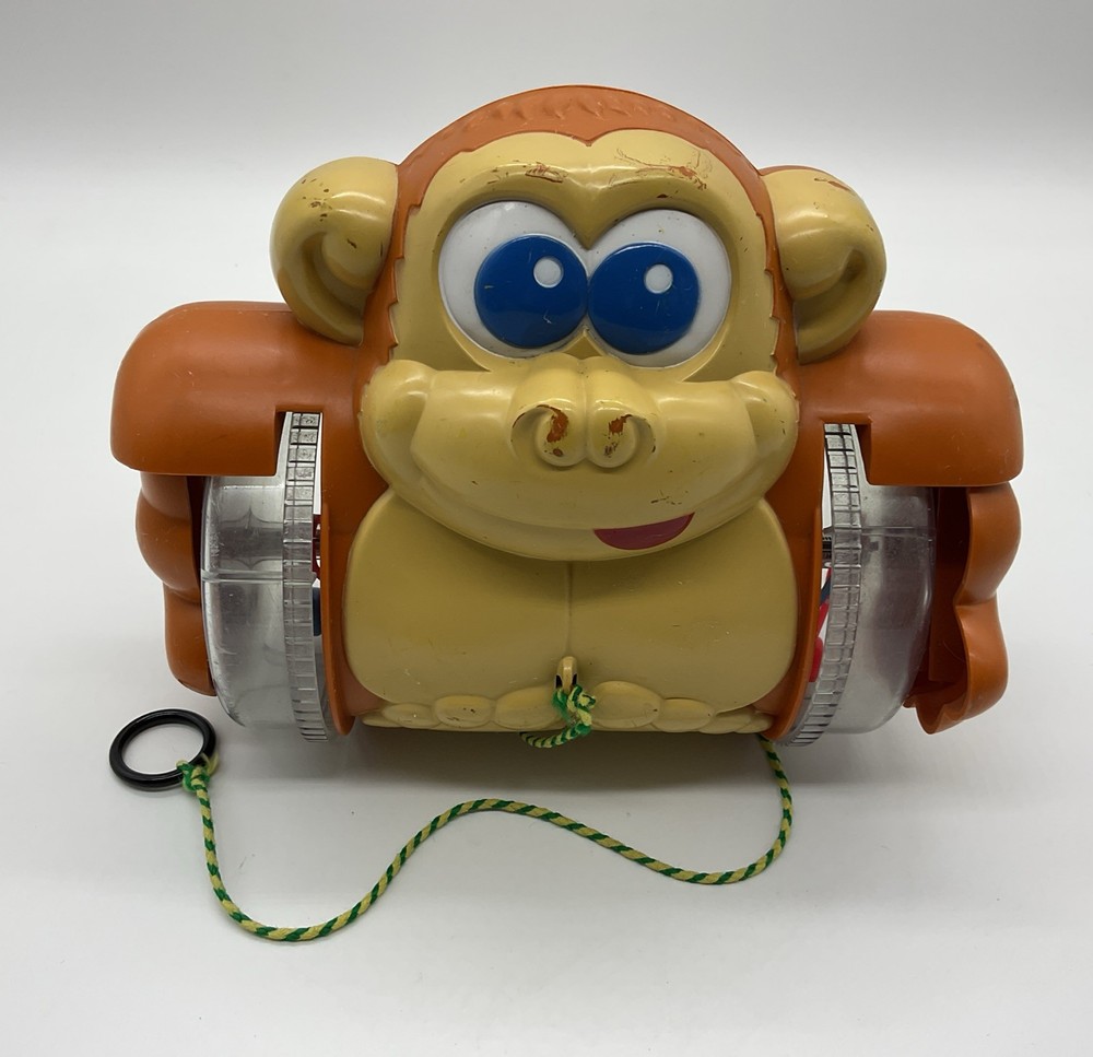 Vintage 1980s Pull Along Monkey Toy Rolling