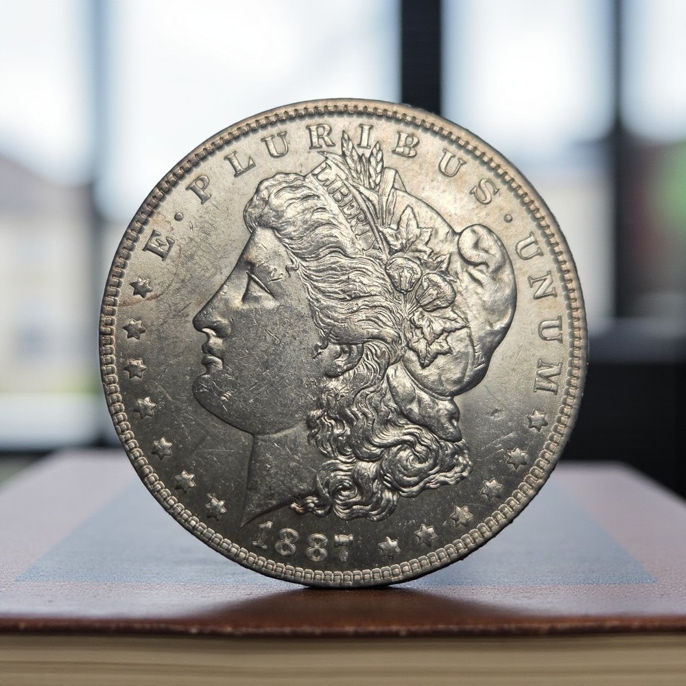 1887 Morgan Silver Dollar  90% Silver About Uncirculated