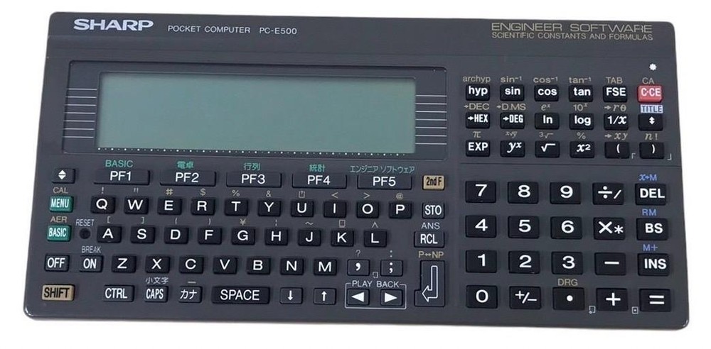Sharp PC-E500 pocket computer 32KB memory large display BASIC language C338