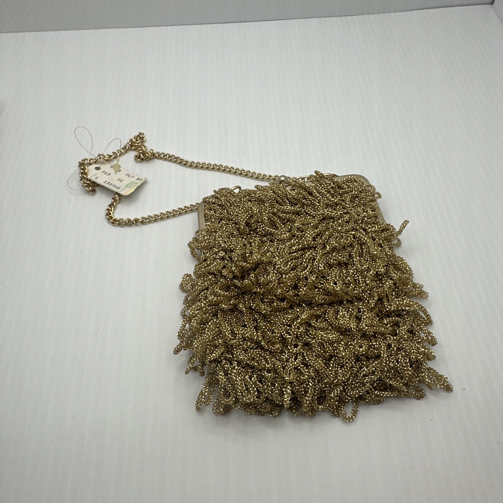 An exclusive import from Italy gold Tone purse R.N. 2906 vintage chain NWT