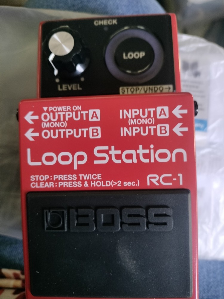 Boss RC-1 Loop Station, Patch Cable, Instrument Cable And Power Cord.
