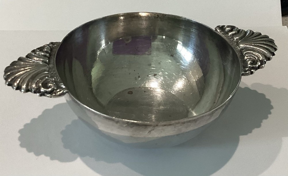 small silver wine tasting bowl