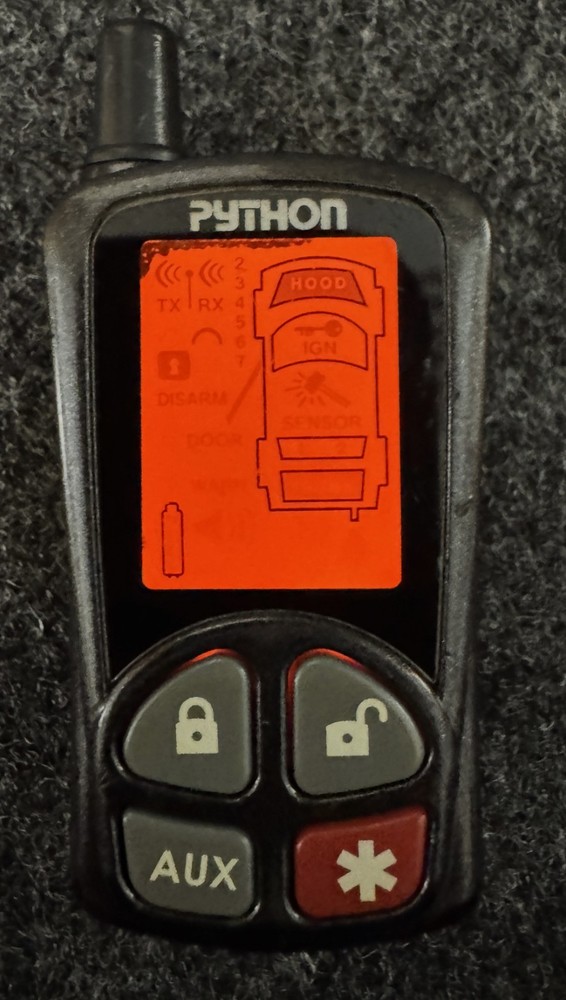 Python V/P/C EZSDEI478 Remote/USED/Case Clip Broke/Light Up/No Confirm on Trans
