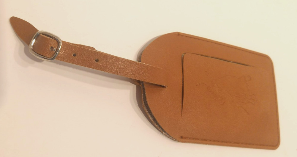 Dewar’s tan leather luggage tag (NOS)