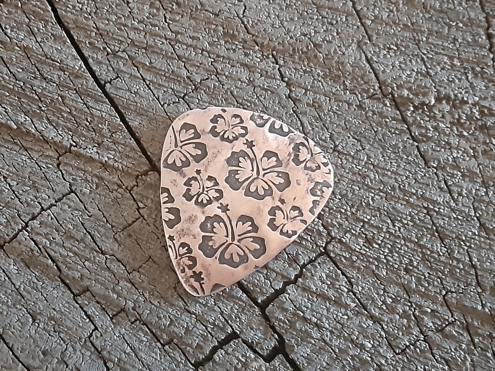 rustic copper guitar pick - playable and handmade - hibiscus