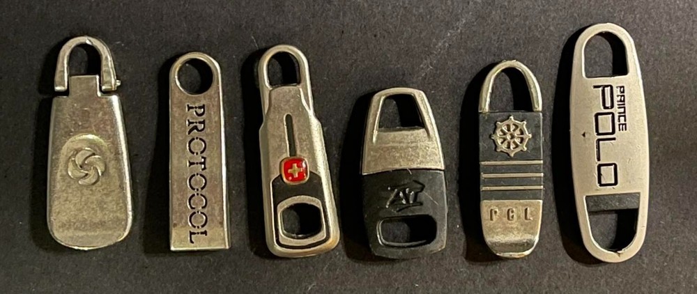 Lot of (6) Assorted Luggage Replacement Zipper Pulls.
