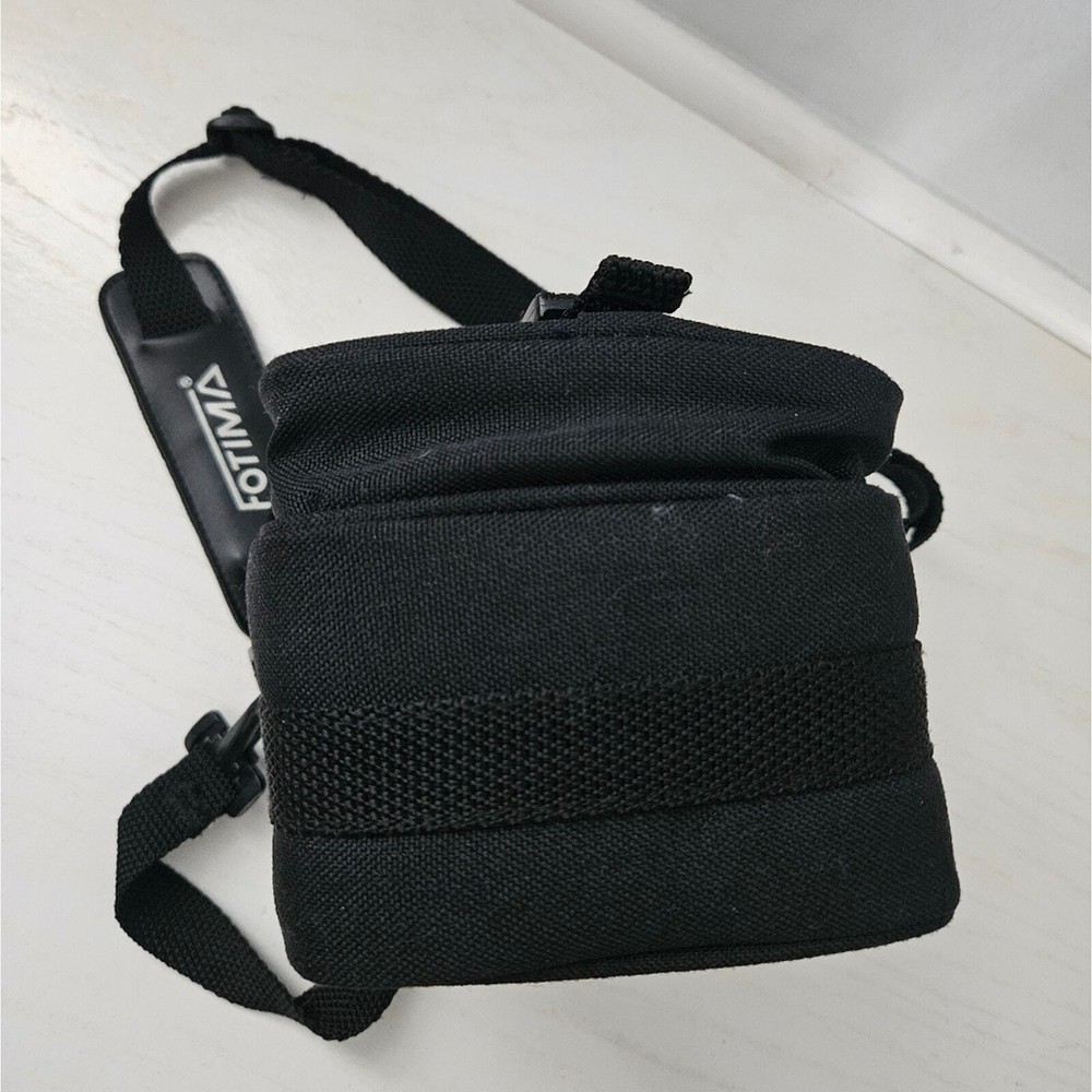 Fotima black camera carrying case model no. 60C with strap and pockets