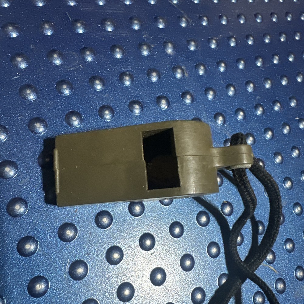 Vintage WW2 U.S. Navy 1944 dated OD Plastic Whistle with Black Lanyard Works