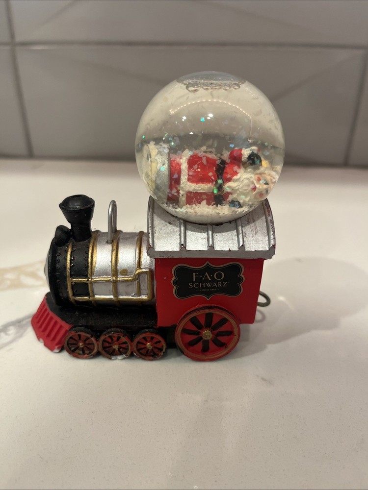 F.A.O SCHWARZ 4- piece Train Snow Globe Set