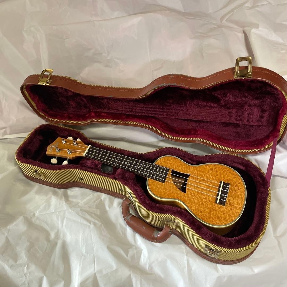 Soprano size ukulele and hard case