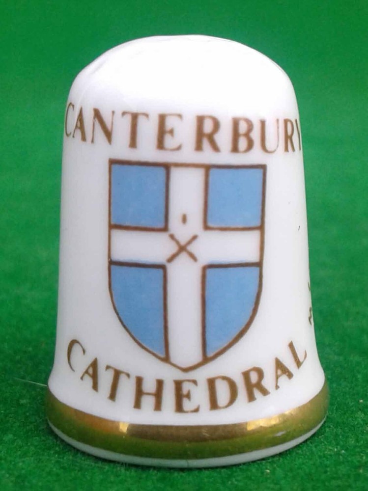 9 CAVERSWALL BONE CHINA THIMBLES.
