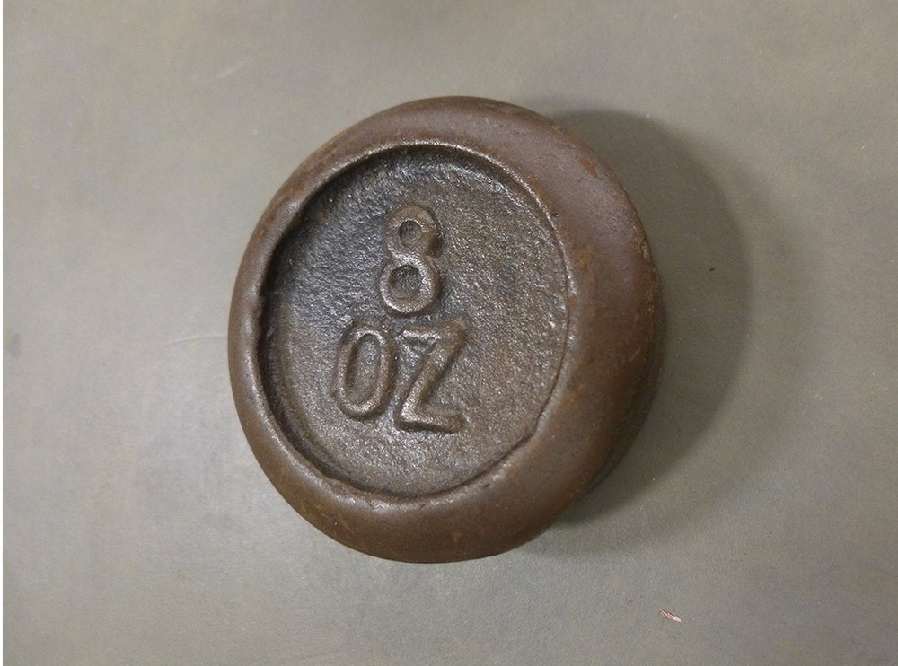 TWO cast iron WEIGHTS trade type SCALE ACCESSORY 1 lb and 8 oz round stacking