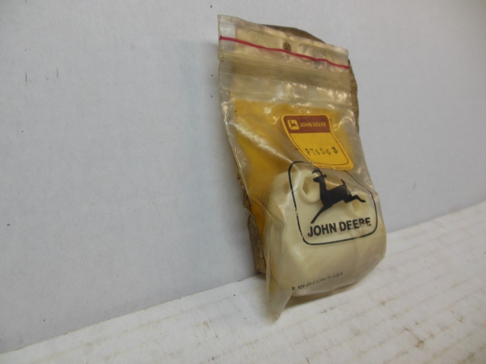 JOHN DEERE PLASTIC CLAMP BRACKET PT6563 OEM NOS