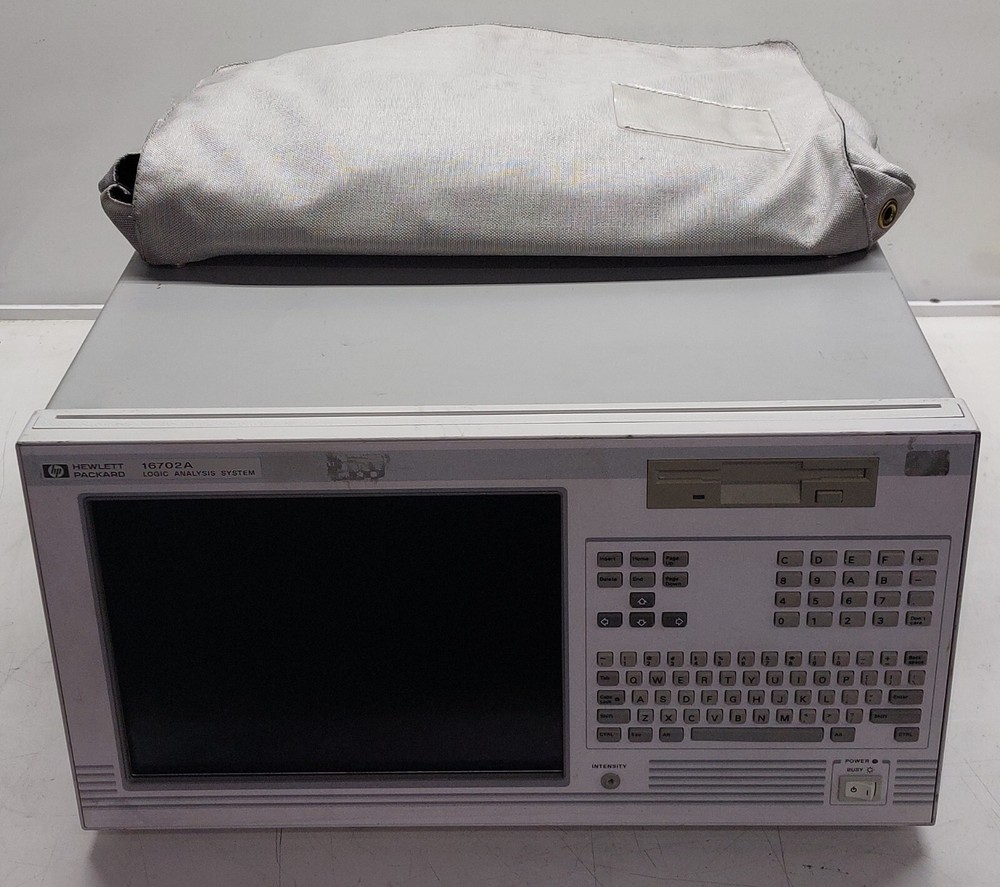 HP LOGIC ANALYSIS SYSTEM 16702A with Manual and cables included as shown