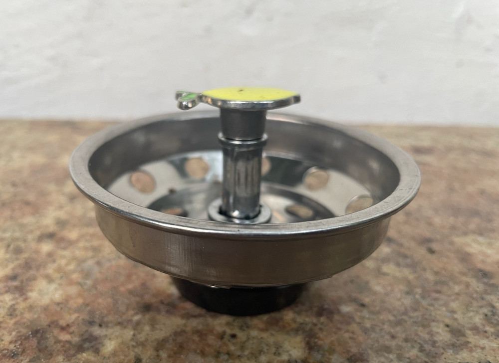 Lemon sink strainer stopper
