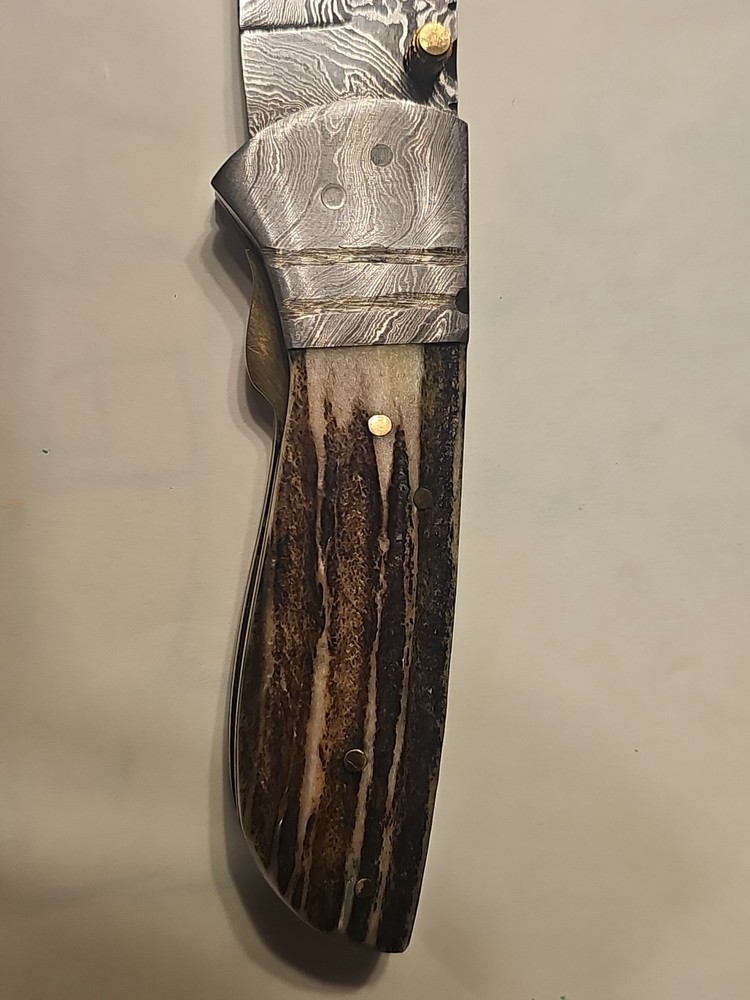 Custom Damascus Blade Lock Back With Textured Handle and leather Sheath