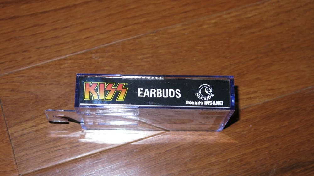 KISS earbuds in cassette style holder case mint sealed 2012 officially licensed