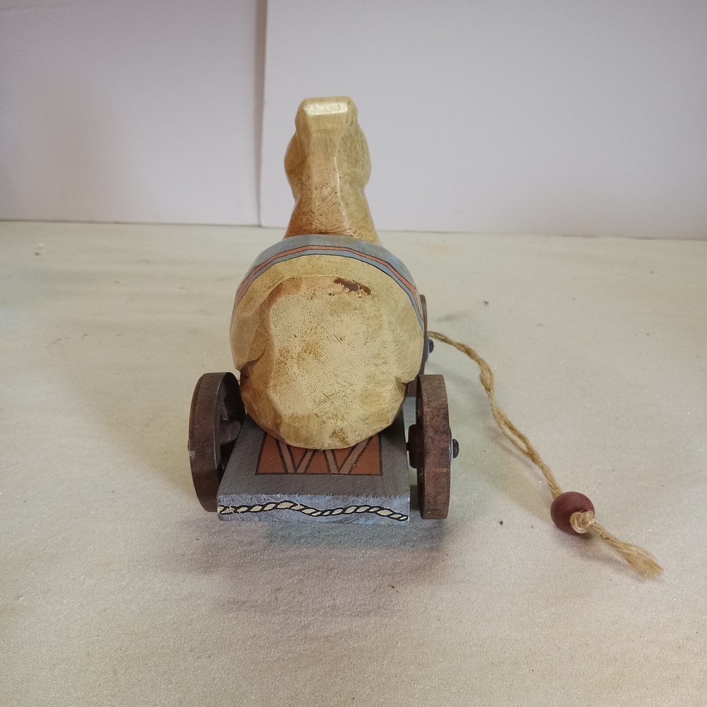 A bunny & duck on wheels pull toy