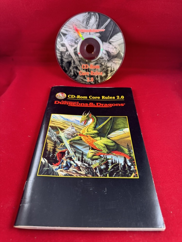 Advanced Dungeons & Dragons CD-Rom Core Rules 2.0 manual and paperwork.
