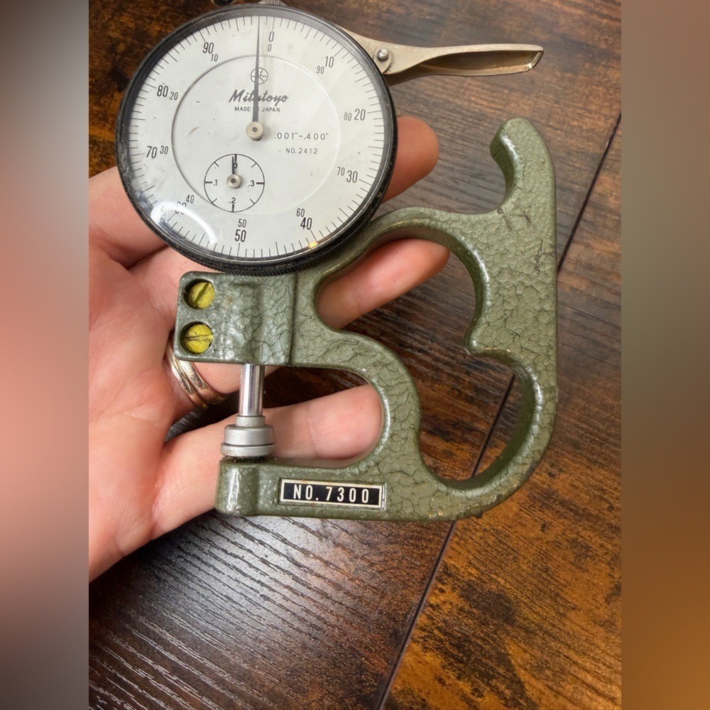 Mitutoyo 7300A Dial Thickness Gauge precision measuring tool.