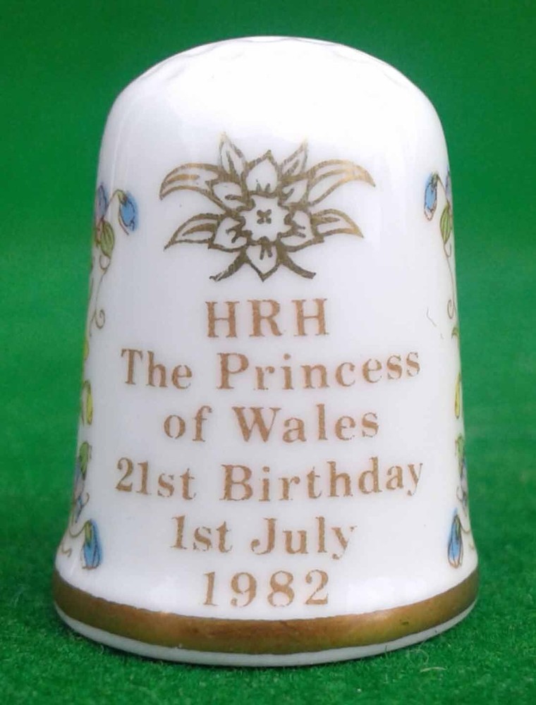 9 CAVERSWALL BONE CHINA THIMBLES.