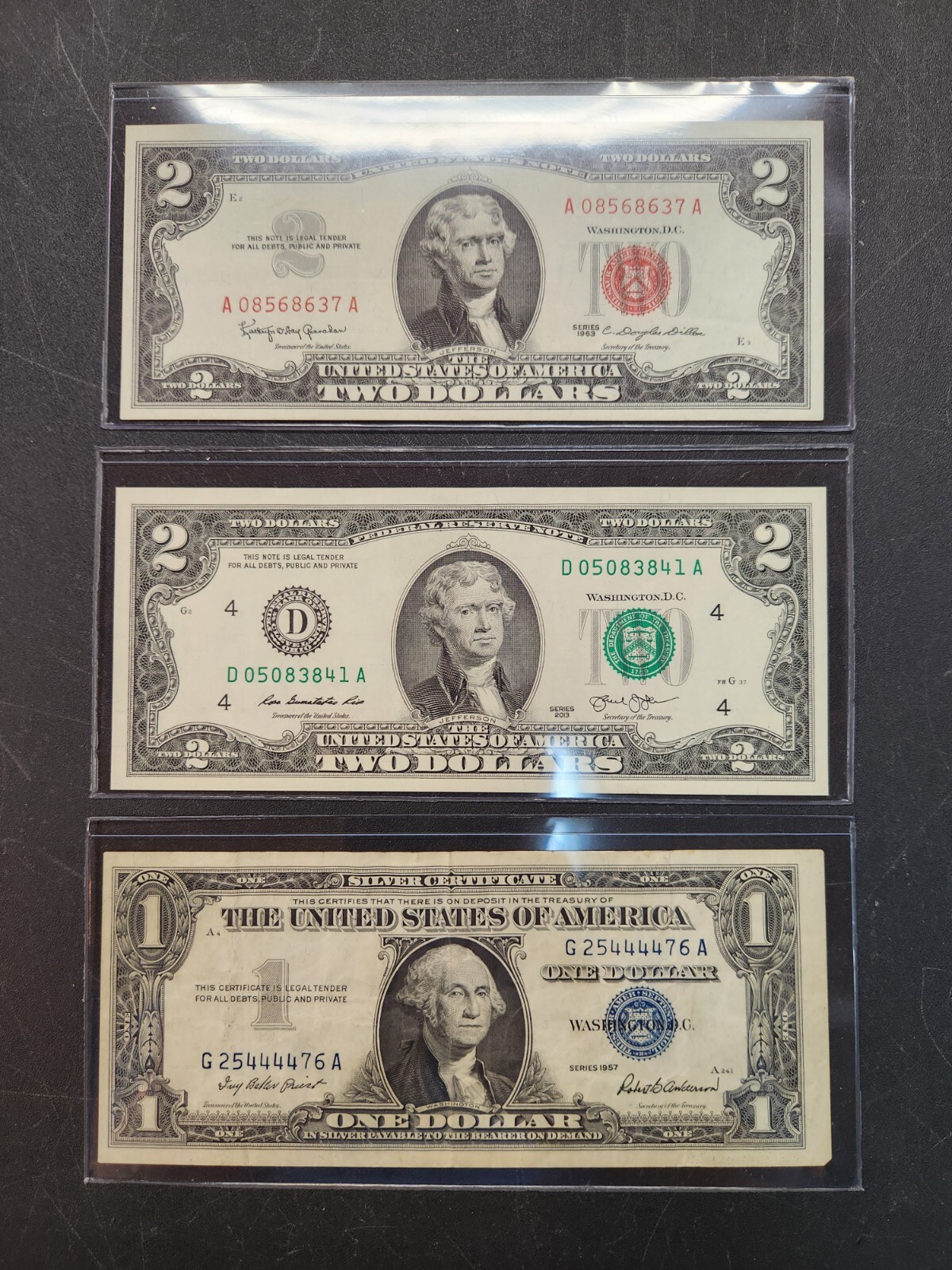 U.S. Bills starter lot $2.00 red seal, silver certificate, uncirculated $2.00