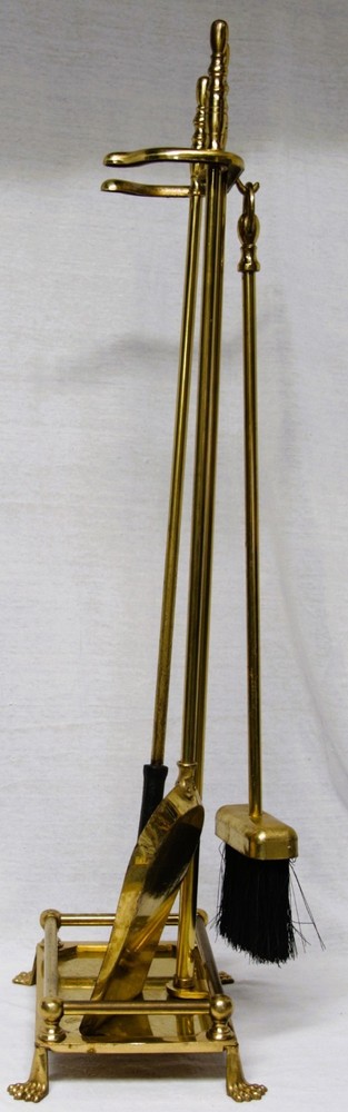 Four-piece brass fireplace poker set