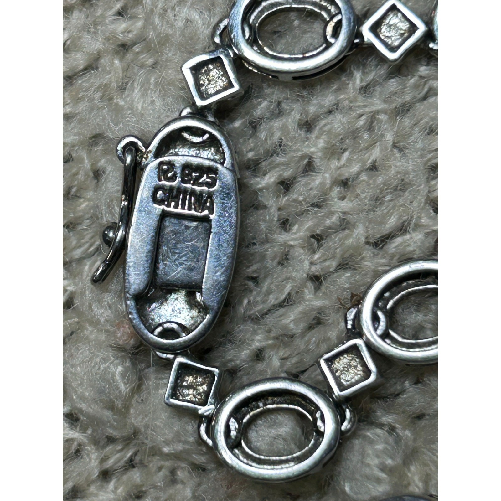 Ross & Simon’s 925 sterling silver made in China light blue stones Necklace