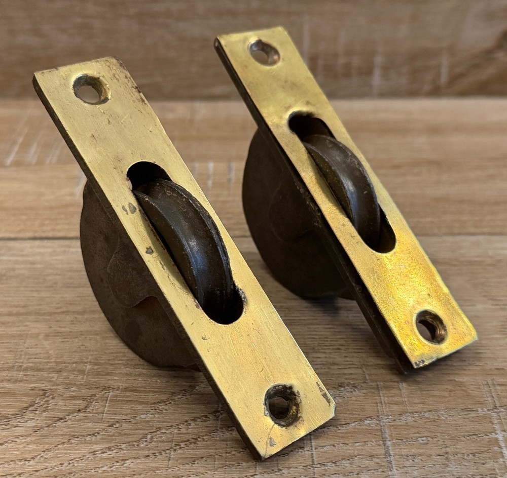 Two Antique Cast Iron, Brass Window Pulleys