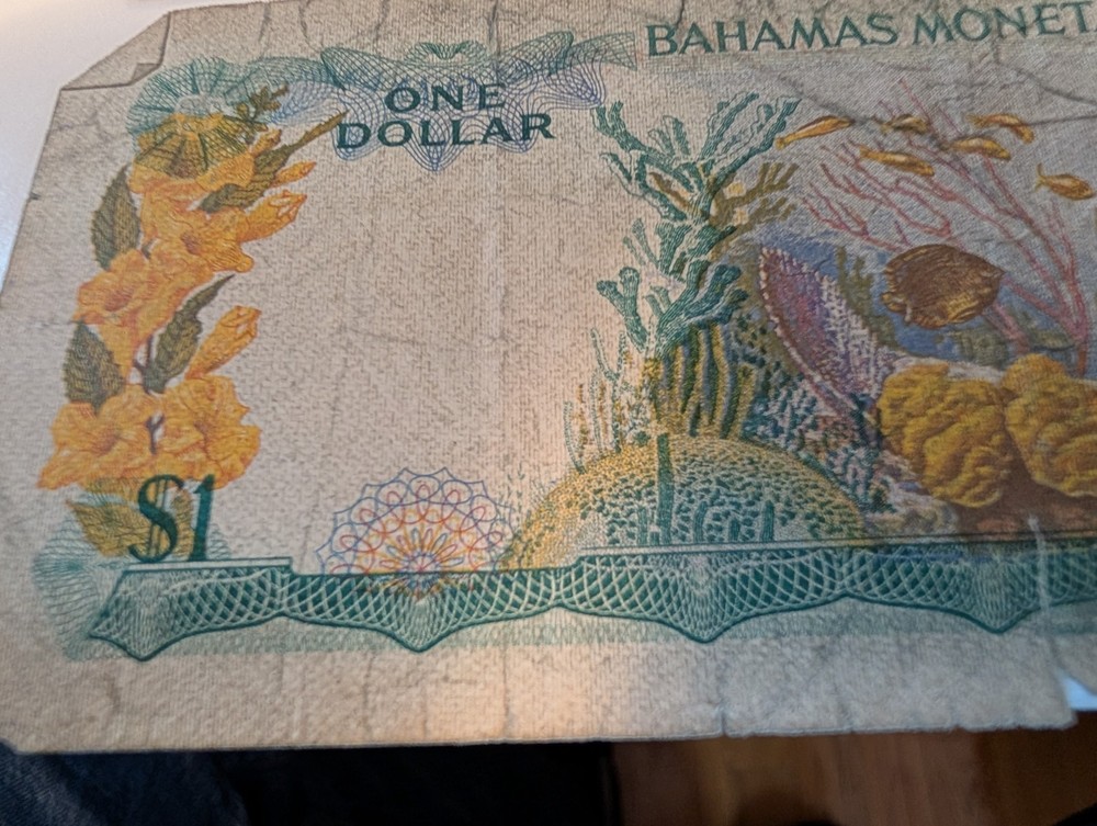 $2 Canadian Note. $1 Bahamas Note