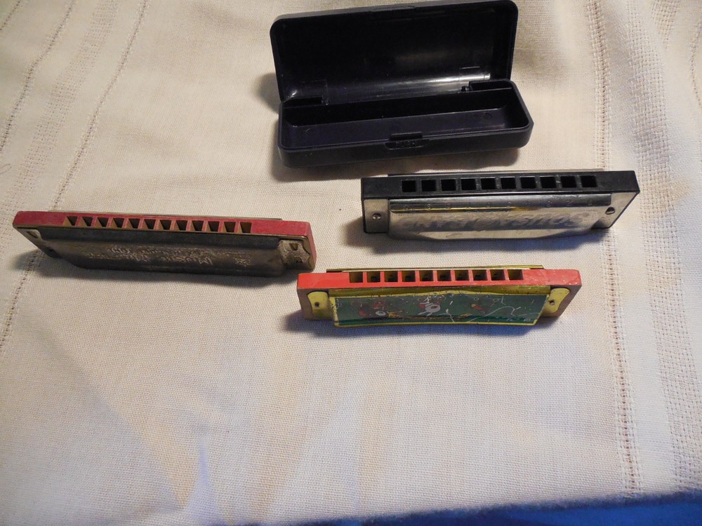 Three harmonicas Sousa band, star, music master
