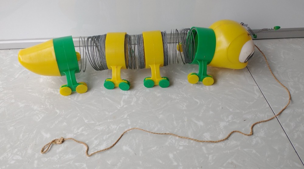 Vintage Slinky Cater-Puller Pull Toy Yellow Head Stretched Incomplete