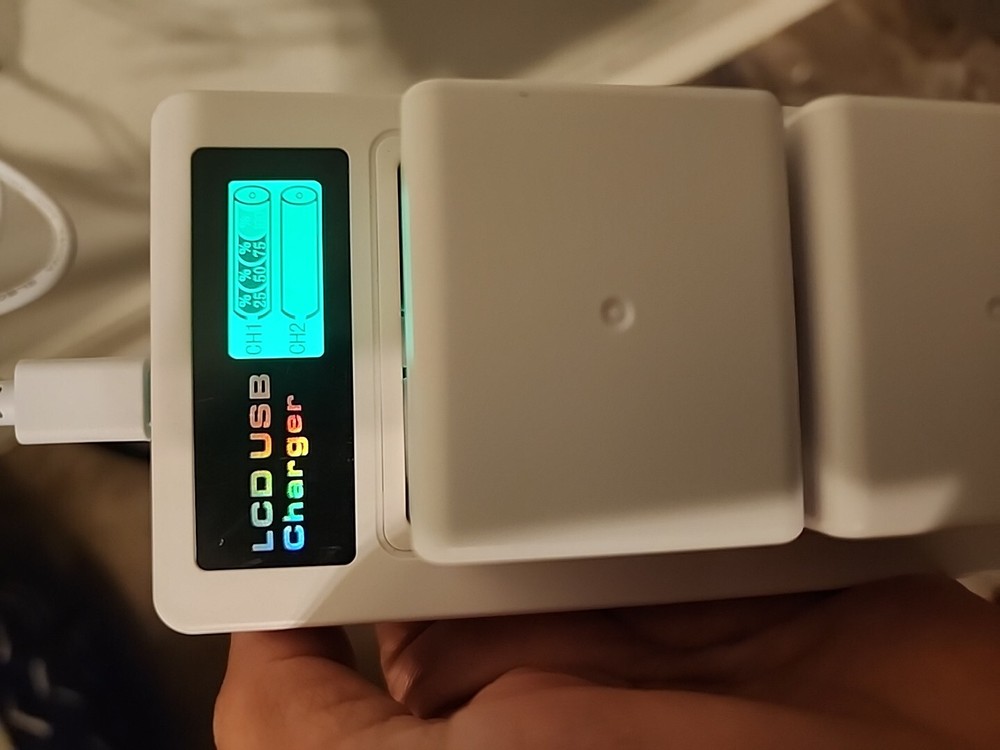 2-Pack Battery and Charger video/ Digital Camera.