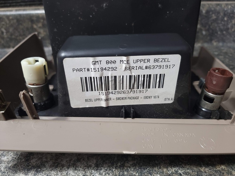 03-06 Silverado Sierra Center Console Smoker's Package Upper Bezel Trim Tan