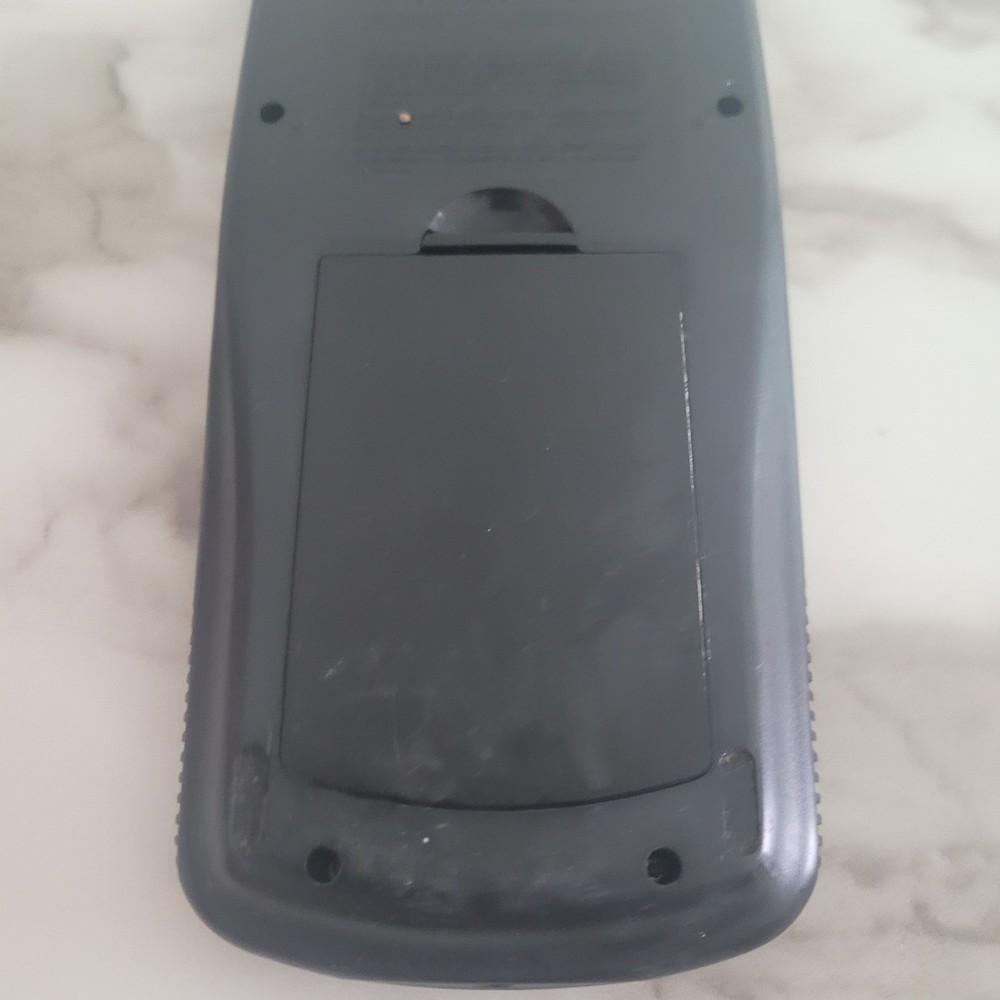 Texas Instruments TI-89 Calculator, powers on, Unknown if fully functional