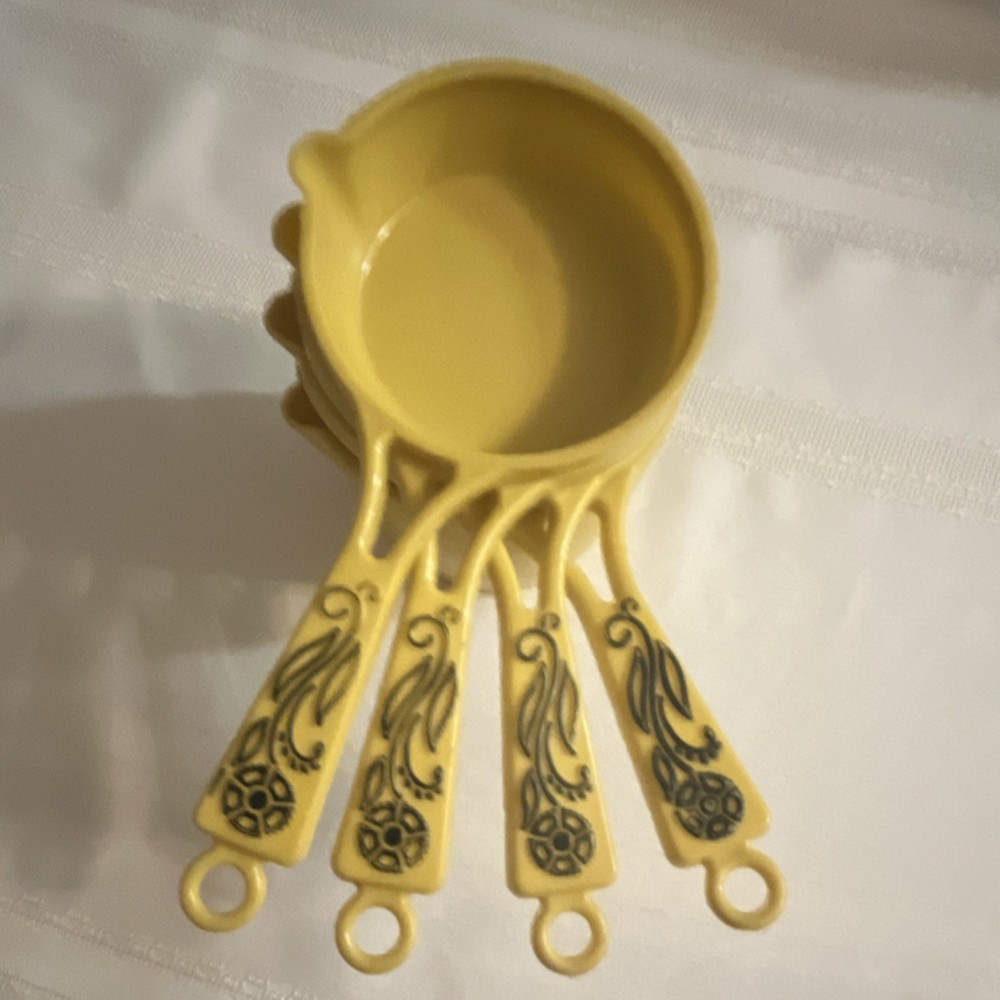 Yellow Plastic Measuring Cup Set Floral Handles Nesting Round 4 Piece