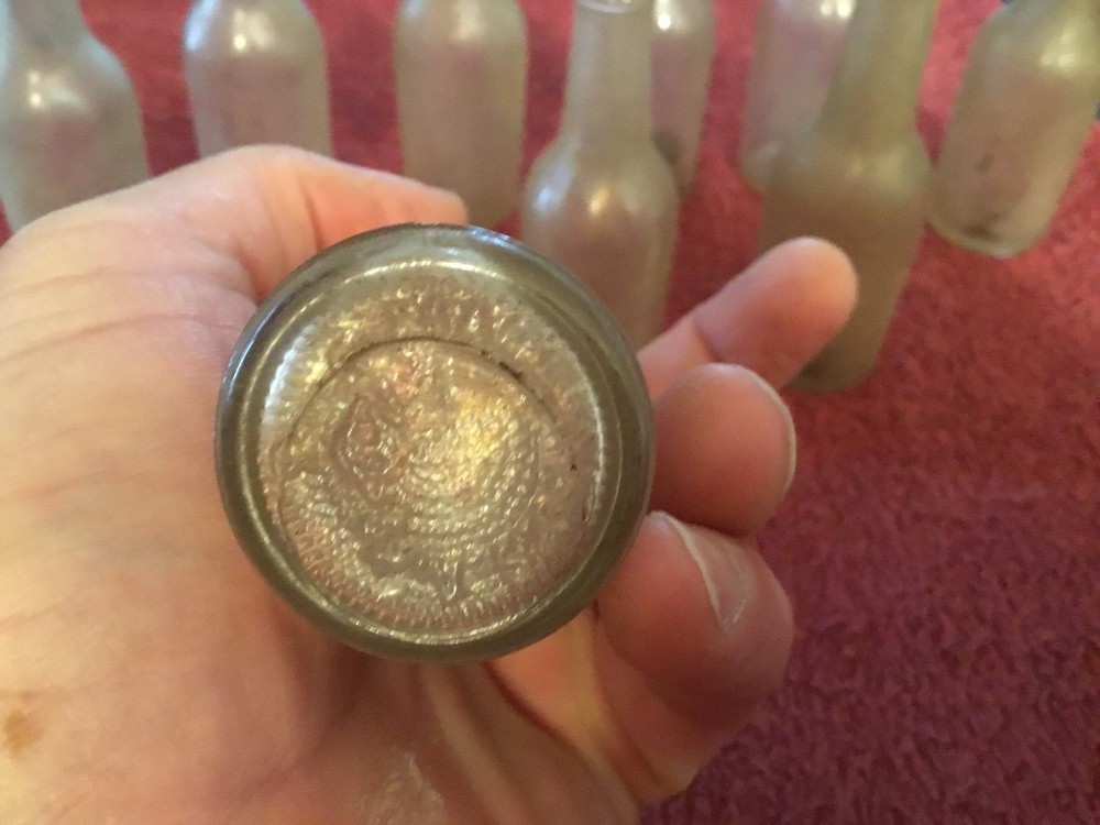 9 Miniature Wiskey Bottles