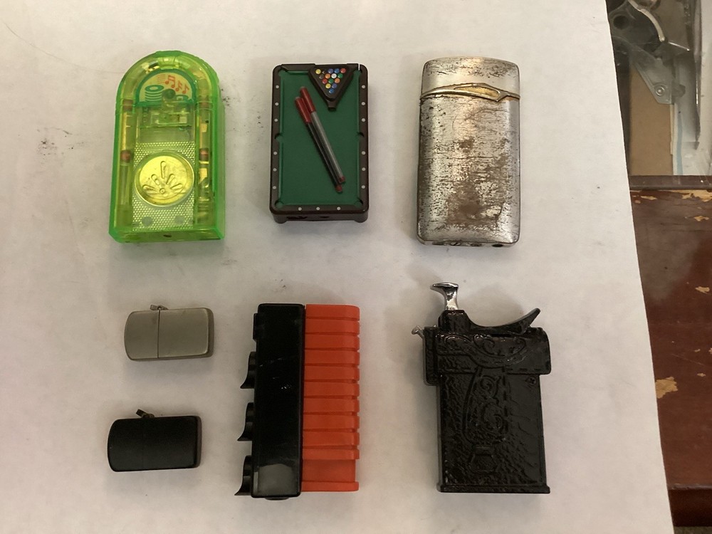 7 UNIQUE NOVELTY LIGHTERS