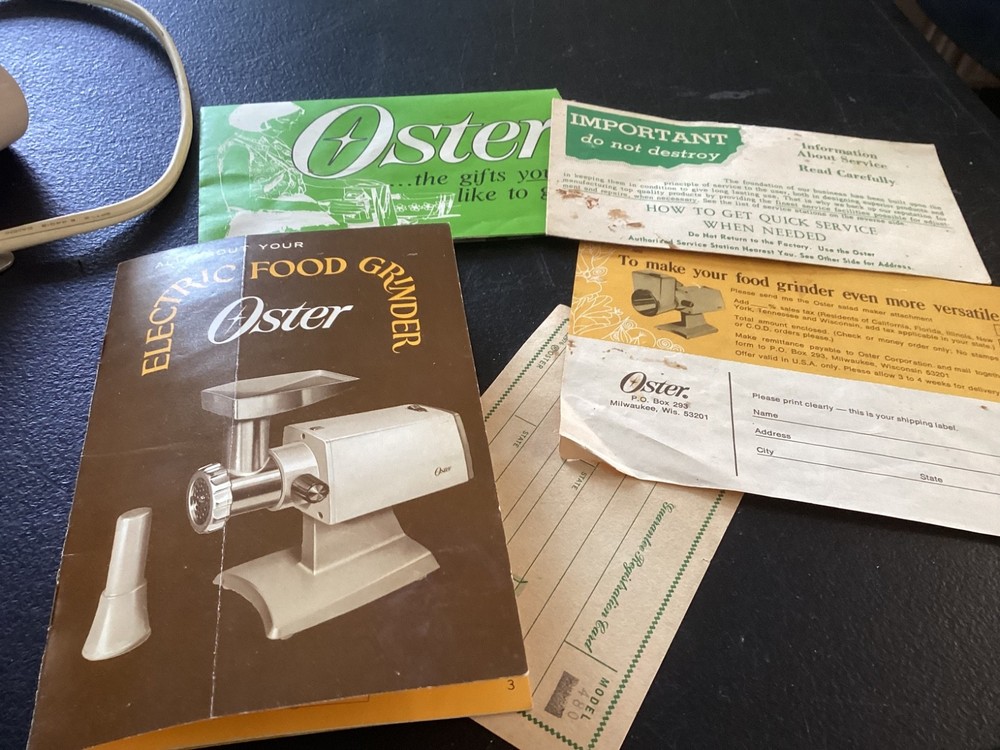 Oster Food Grinder Model 480 E, with attachments, and original paperwork