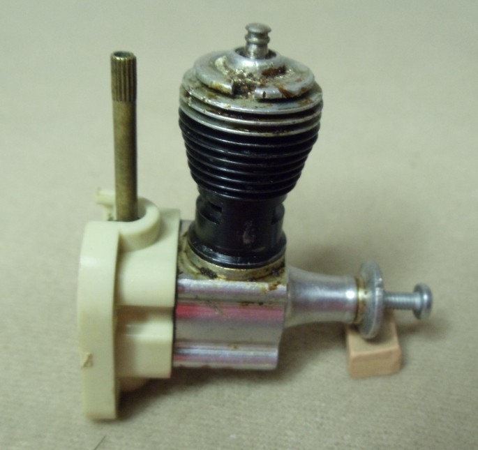 Cox .049 Glow Engine With a White Radial  Mount.