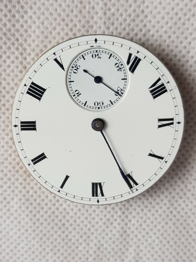 Antique Pocket Watch Movement and Face.