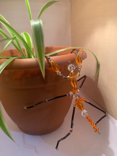 Handmade bead and wire praying mantis