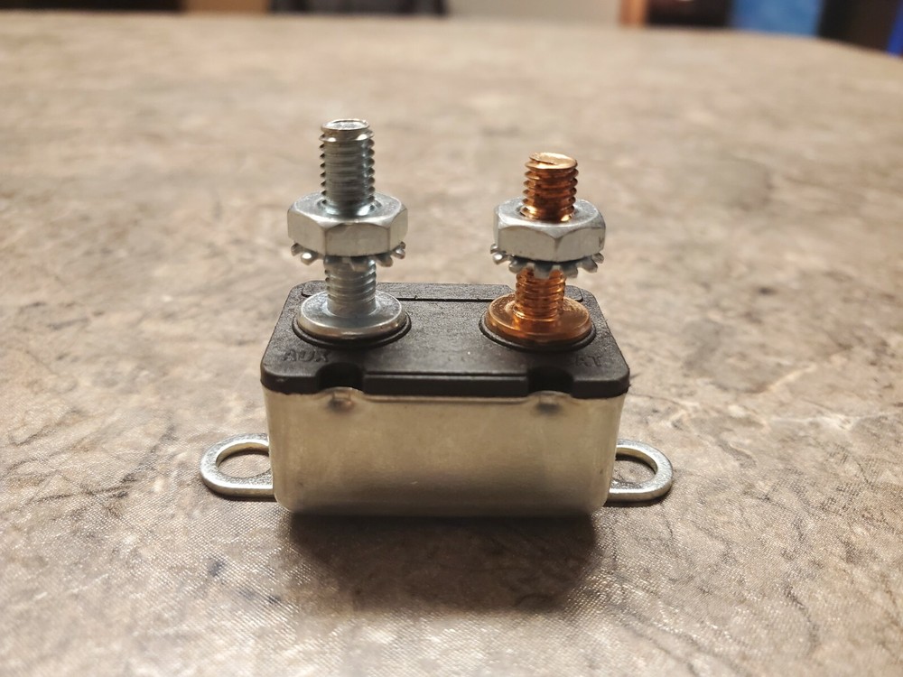 12VOLT / 10 AMP AUTOMATIC RESET CIRCUIT BREAKER METAL WITH BRACKET