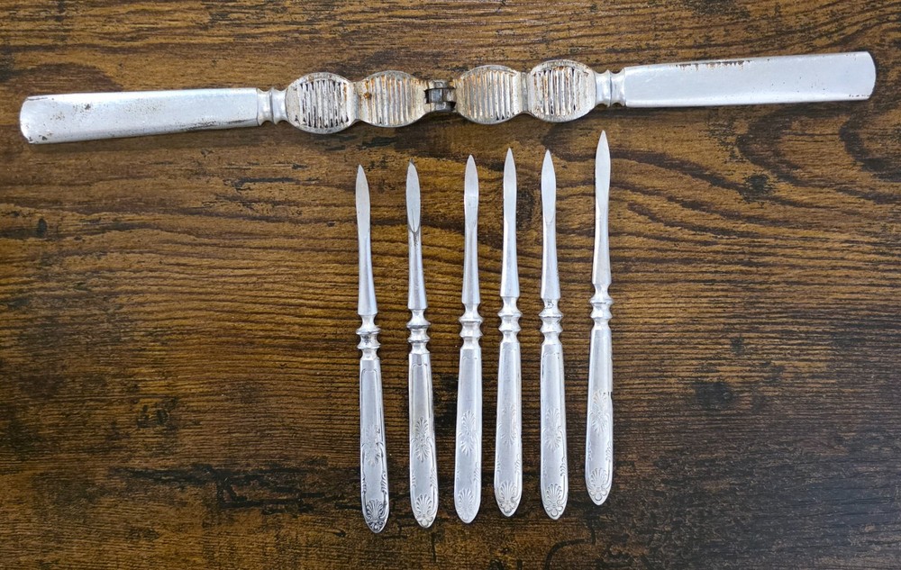 7pc VTG 1847 Rogers Bros Silver Plate Ornate Nutcracker & Pick Set