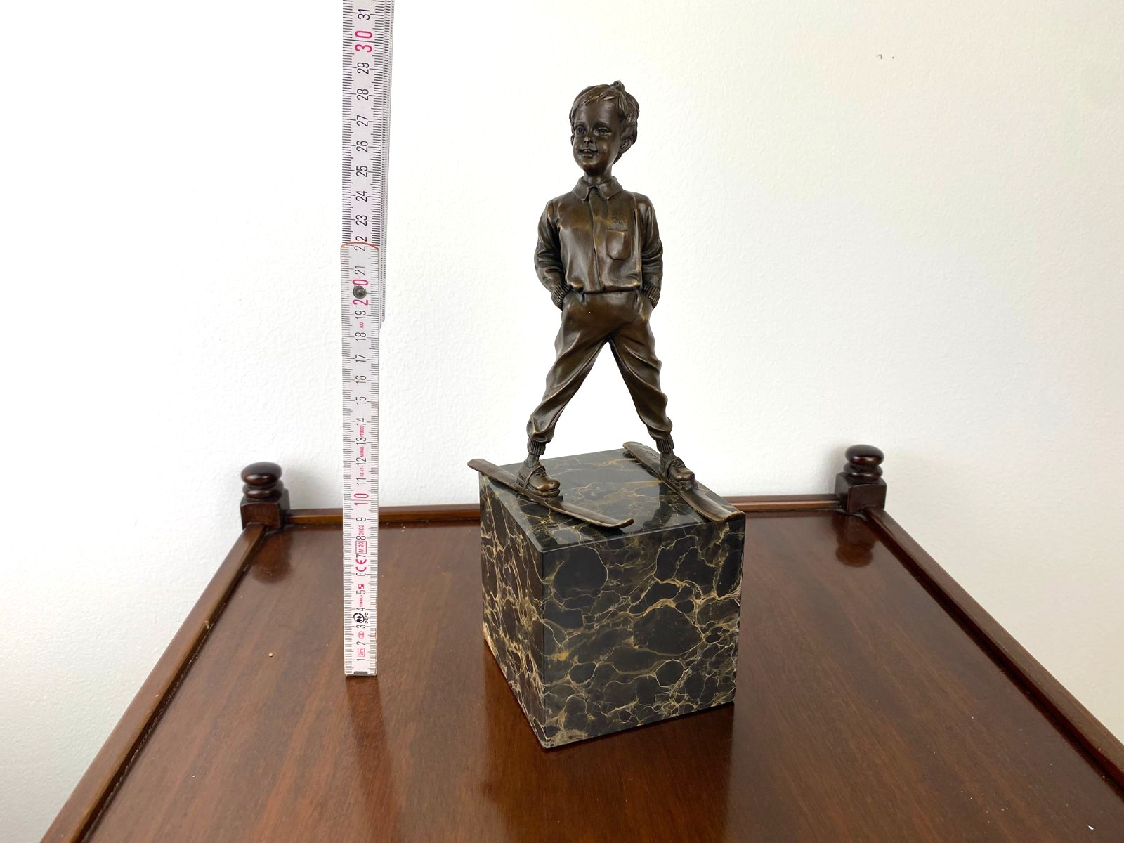 Bronze sculpture boy with ski on marble base after Ferdinand Preiss