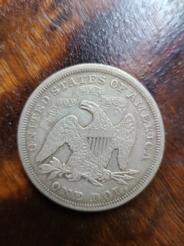 1870 Seated Liberty Dollar Fine