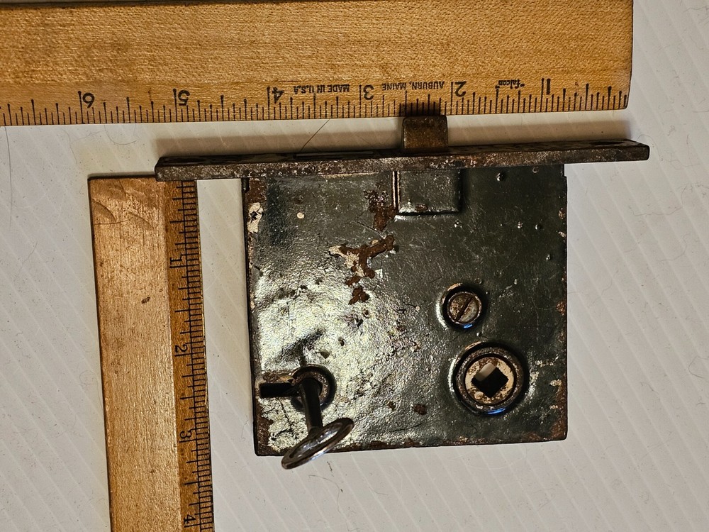A OLD DOOR LOCK and KEY it WORKS. E