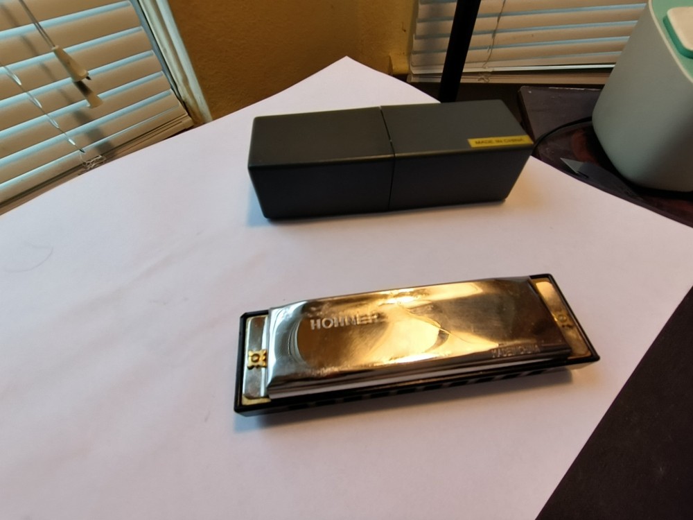 Used HARMONICA SAYS HOHNER ON IT WITH CASE